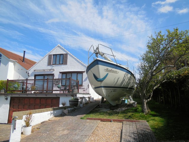 Boat by cottage in Longhill Road
