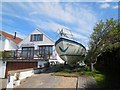 Boat by cottage in Longhill Road