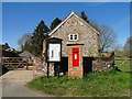 Victorian postbox and village notice board