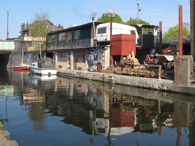 Canal-side yard with caravan as office