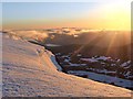 NN4971 : View ENE from near Ben Alder summit at dawn by Ross
