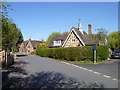 Junction of School Lane with High Street showing school