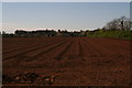 Down the red earth furrows to Redbourne