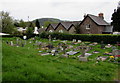 SO5112 : Small churchyard in Wyesham by Jaggery