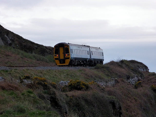 A southbound train passes Cae-du campsite at about 7:30 in the evening