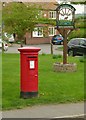 The Sands Long Clawson postbox ref LE14 55 and Long Clawson village sign