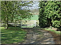 NZ0968 : Gated farm track, Whitchester by JThomas