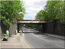 TQ2181 : Railway bridge and street cleaners, Old Oak Common Lane by David Hawgood