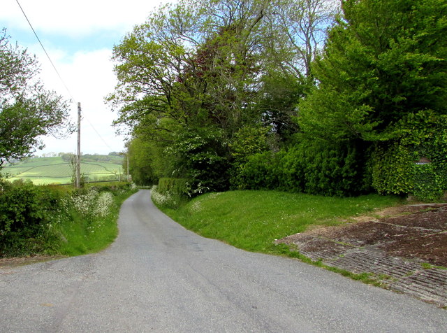 Minor road heads NW towards the remains of Whitland Abbey