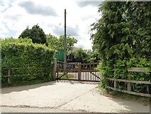 TM0946 : Entrance to Woodlands Farm by Adrian S Pye