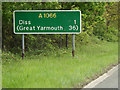 TM1079 : Roadsign on the A1066 High Road by Geographer