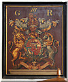 TM4275 : St Peter, Wenhaston - Royal Arms by John Salmon