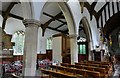 TM4275 : Wenhaston: St. Peter's Church: View across the nave towards the organ by Michael Garlick