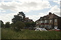 View of houses on Forest View from the path leading into the forest #2