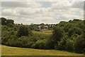 View of houses on Woodman Lane from Yates Meadow