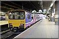 SJ8499 : Northern Rail Class 150, 150112, platform 3b, Manchester Victoria railway station by El Pollock