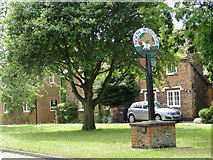 TF6424 : North Wootton village sign by Adrian S Pye