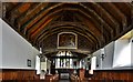 SU7709 : Racton: St.Peter's Church: The nave and royal arms of George II by Michael Garlick