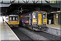 SJ8499 : Northern Rail units, Manchester Victoria railway station by El Pollock