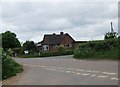 Broad   Road  at  Priory  Wall  Cross