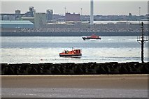 SJ3194 : RNLI hovercraft and Liverpool Pilot vessel, River Mersey by El Pollock