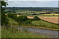 ST8920 : View over B3081 on Charlton Down by David Martin