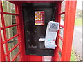 Inside a disused telephone box, Whitebrook