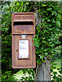 Scruffy post box near Welcombe Mouth, Devon