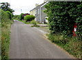 Row of three houses and a red postbox, St Ishmael