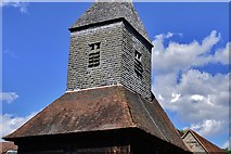TL6600 : Margaretting: St. Margaret's Church: The c15th wooden tower and shingled broach spire by Michael Garlick