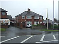 SJ9247 : Houses on Ash Bank Road (A52) by JThomas