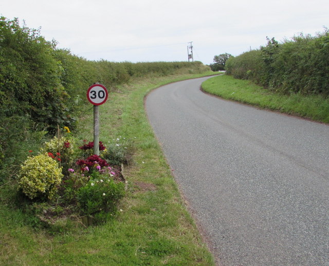 Flowery 30 sign in Freshwater East