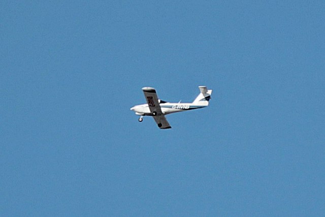 Piper PA38 Tomahawk, G-RVNB, above the River Mersey