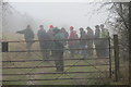 The guided party look at an area of unimproved chalk grassland