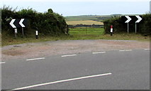 SS0198 : Field gate between bend signs near Freshwater East by Jaggery