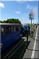 Train heading along Beach Road