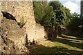 View of a section of the London Wall from the area near the underground car park near the Museum of London