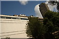 View of 140 London Wall, the domes of Andrewes House and one of the Barbican Towers from the area near the underground car park