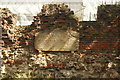 View of a plaque on the ruins of the London Wall in St Alphage