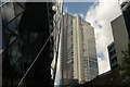 View of the Heron Tower from the foot of the Gherkin