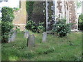 Gravestones at the foot of St. Mary