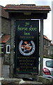 Sign for the Horseshoe Inn, Egton