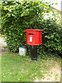 TM0969 : Post Office The Green Postbox by Geographer