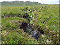 NC3466 : Peat grough or possibly a deeply-eroded drainage channel on moorland near Daill River on Cape Wrath by ian shiell