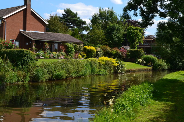 Canalside house and garden at Acton Trussell