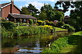 Canalside house and garden at Acton Trussell