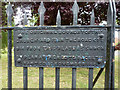 Cast-iron plate on churchyard fence, Great Wakering