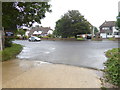 Footpath reaches Pagham Road from the west