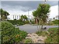 Seaside garden with Royal Norfolk Hotel behind