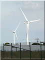 TM3979 : Wind Turbines & Solar Panels at Upper Holton Wind & Solar Farm by Geographer